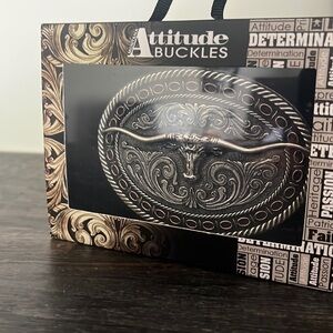 Montana silversmith belt buckle. Barb edge long horn oval.